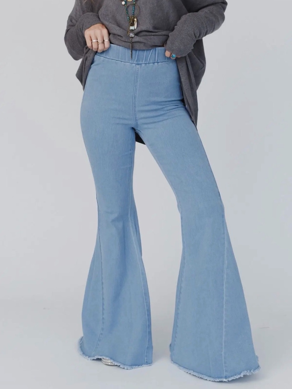 Three Bird Nest Light Blue High-Rise Flare Jean
*SUN DAMAGE *